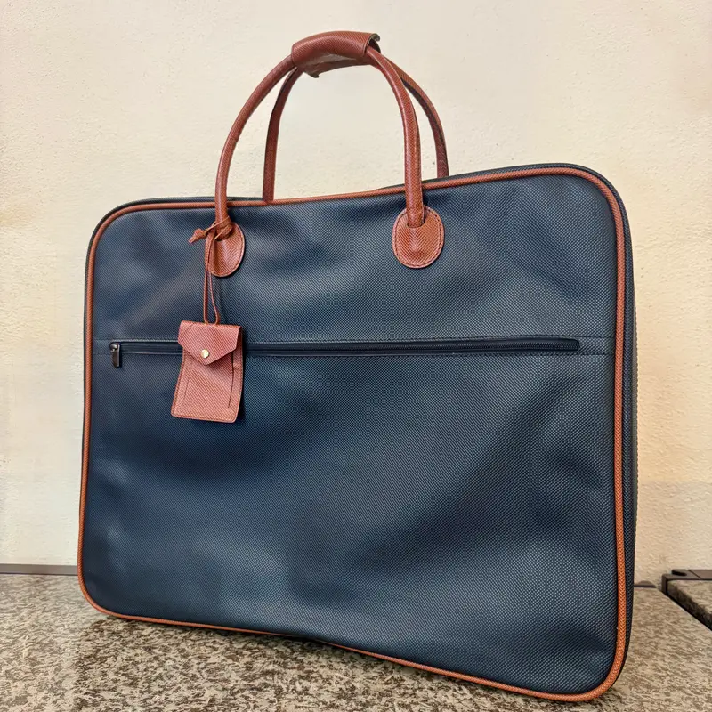 Bottega Veneta porta abiti blu scuro pelle e tela vintage 1990 ca