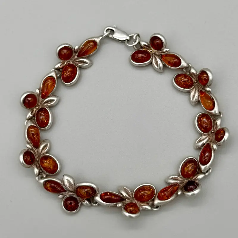Bracciale in ambra ed argento 925 decorazioni floreali Italia 1990 ca