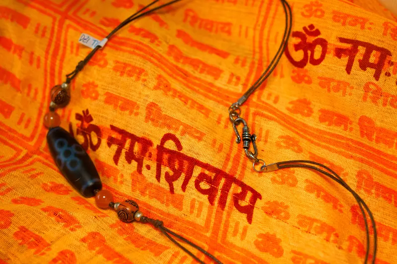 bracciale intreccio con dzi tibetano