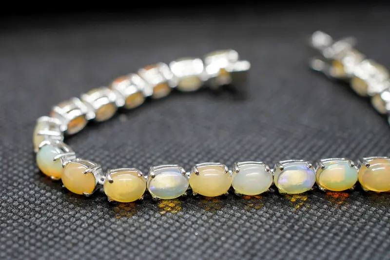 Bracciale tennis artigianale in argento 925 e opale naturale