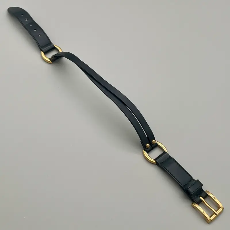 Bracciale Trussardi pelle nera e metalleria oro 1990 ca