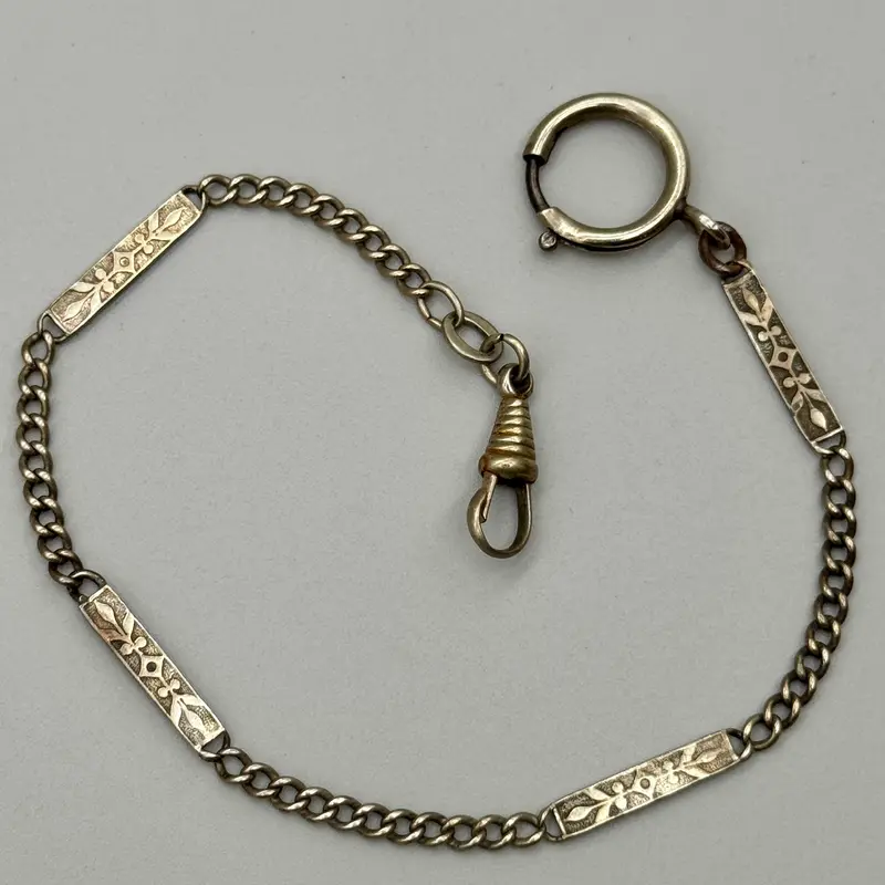 Catena orologio tasca alpacca decoro floreale Italia 1920 ca
