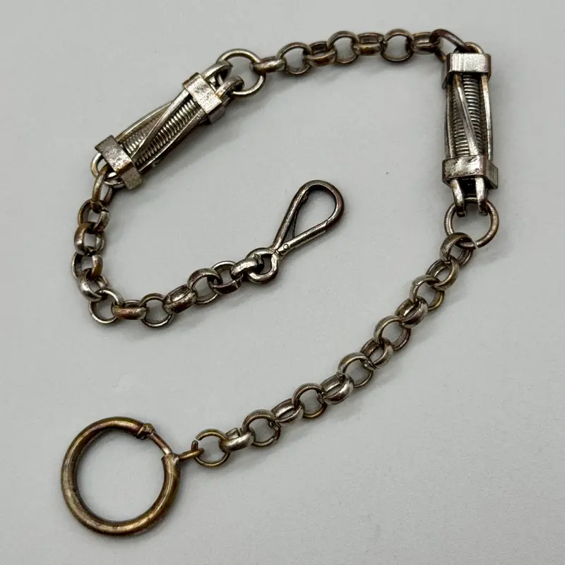 Catena orologio tasca metallo decoro molla art deco Francia 1930 ca