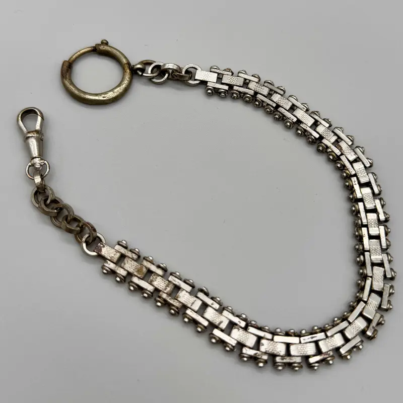 Catena orologio tasca metallo maglia stretta lavorata Italia 1950 ca