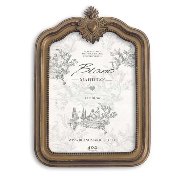 Cornice dorata con cuore sacro