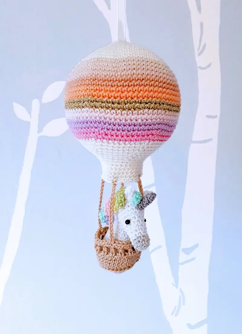 Crochet pattern amigurumi unicorn in a hot air balloon