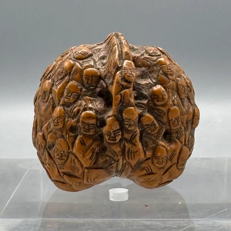 Scultura noce Millevolti Cina fine XIX sec.