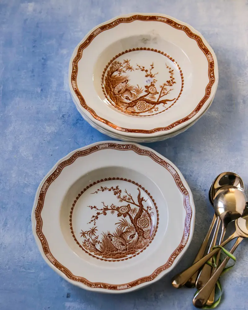Set tre piatti cupi con decoro quaglie