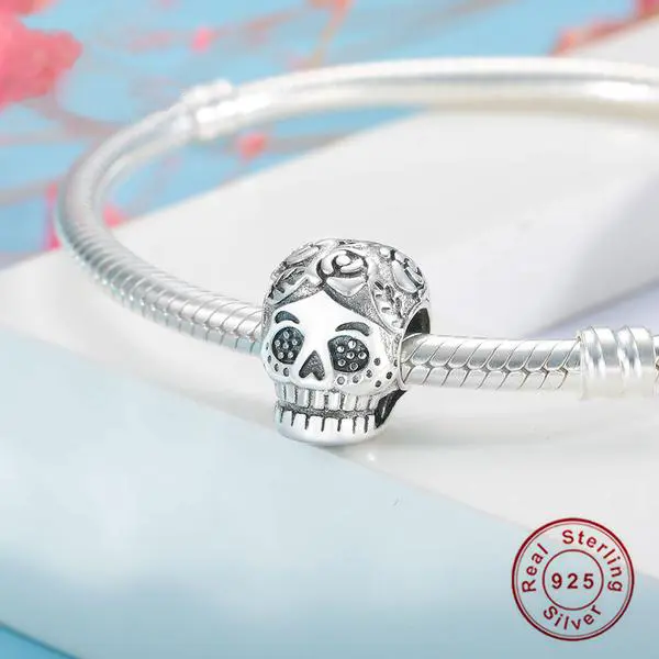 "SkullCharm" - charm teschio con fiori in argento - IN ESCLUSIVA
