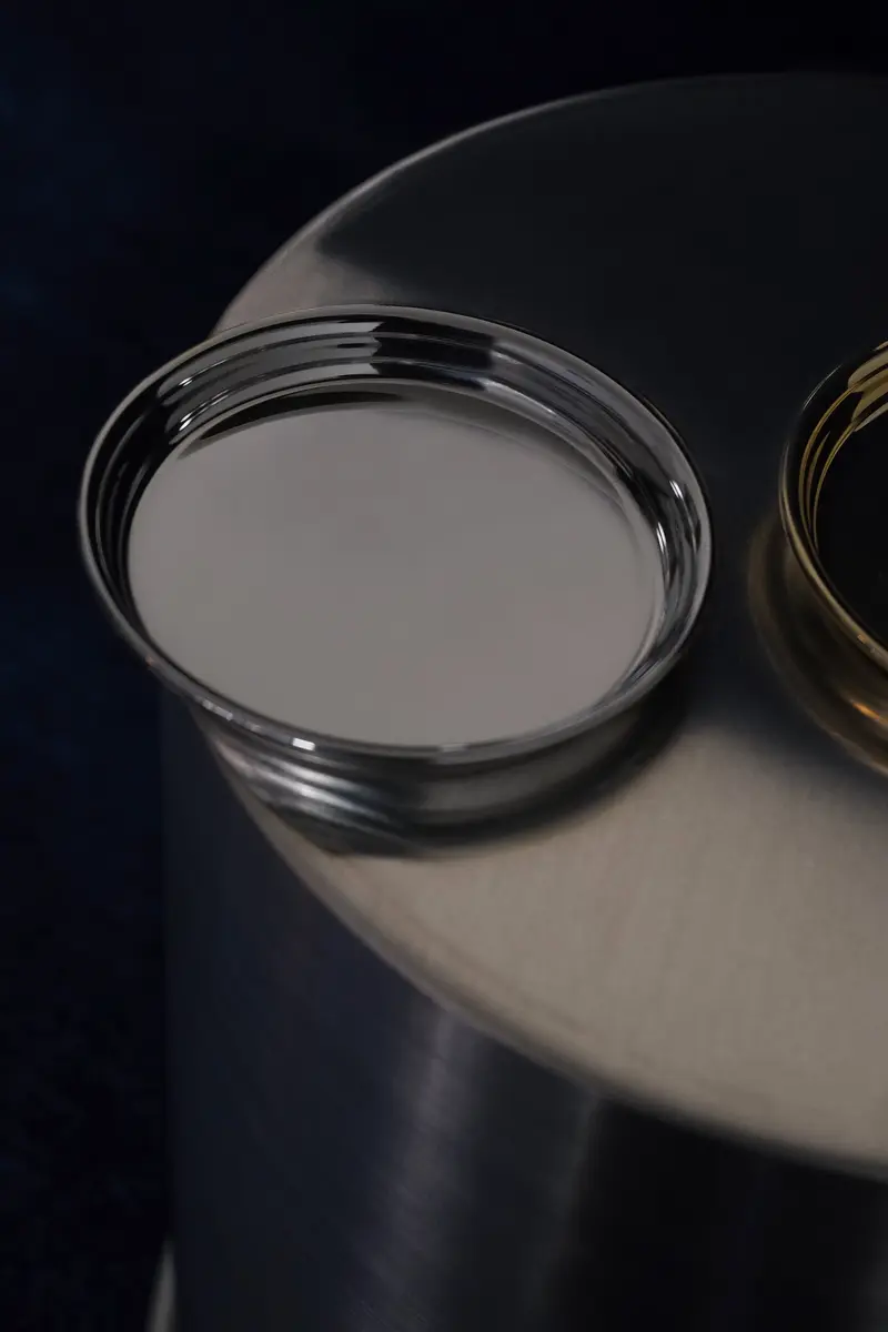 Sottobicchiere/piattino in acciaio inox lucido con bordo arrotondato