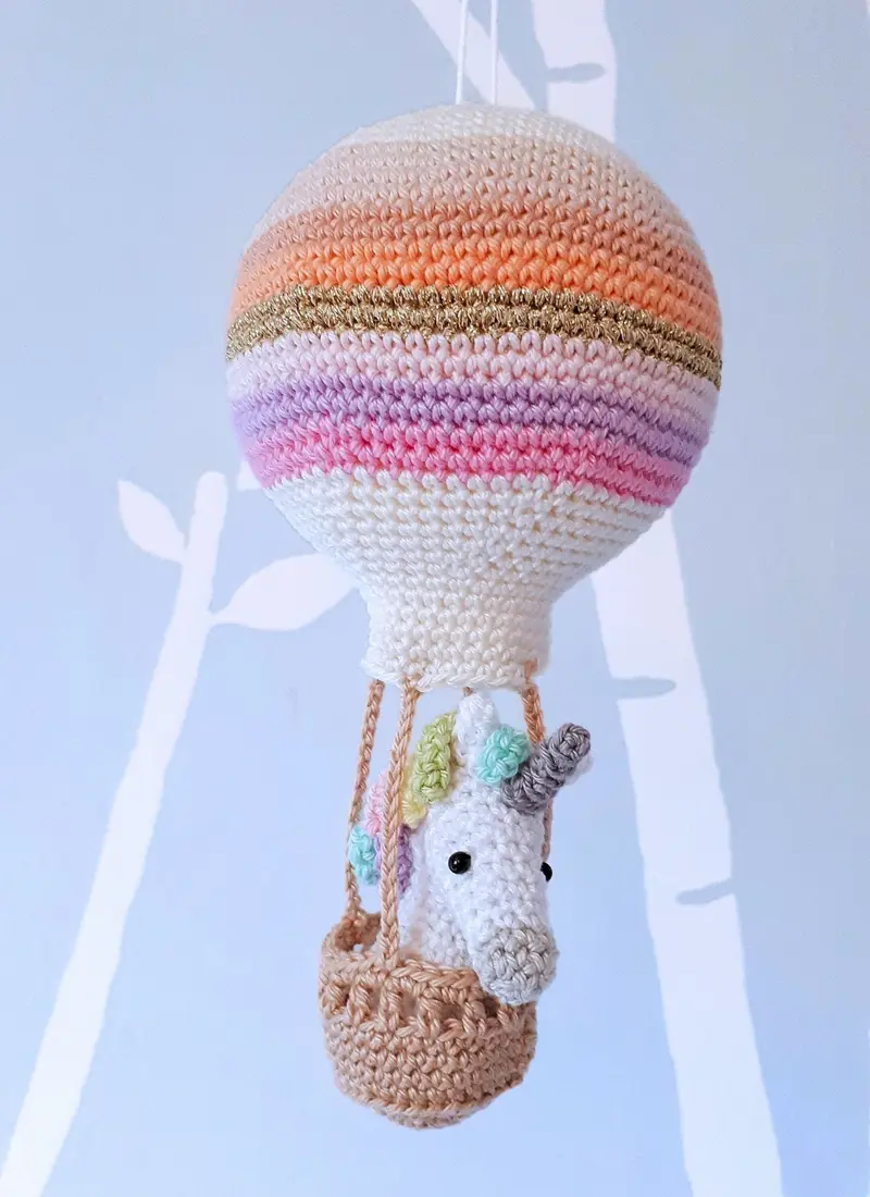 Unicorn in a hot air balloon, crochet nursery decoration